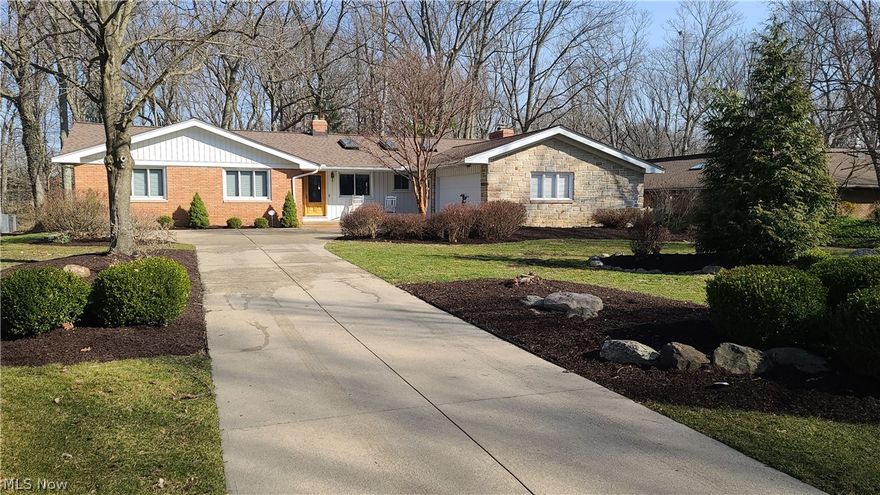 Independence Ranch! Words cannot describe this outstanding 4,200+ square foot (includes finished basement) and true 4-bedroom 2 full and 2 half baths. This home is nestled in the heart of Independence on a quiet cul-de-sac street with .62 acres backing woods, affording complete wooded privacy. Close to National Park.  Start your tour by entering through the custom mahogany door with sidelight to an open floor plan and enjoy the wooded view from kitchen, living, dining and family room with gas fireplace. The three-season room will give you that added room to entertain as it leads to the back paver brick patio or just sit and relax with your morning coffee or tea. The kitchen was completely remodeled from vaulting the ceiling and adding 3 skylights, walk in pantry, all new cabinetry, stainless-steel appliances, Jenn Air stove top, double oven, and wine cooler, along with a new ceramic floor. Updated laundry area with plenty of cabinets for storage.  Entire first floor freshly painted inc