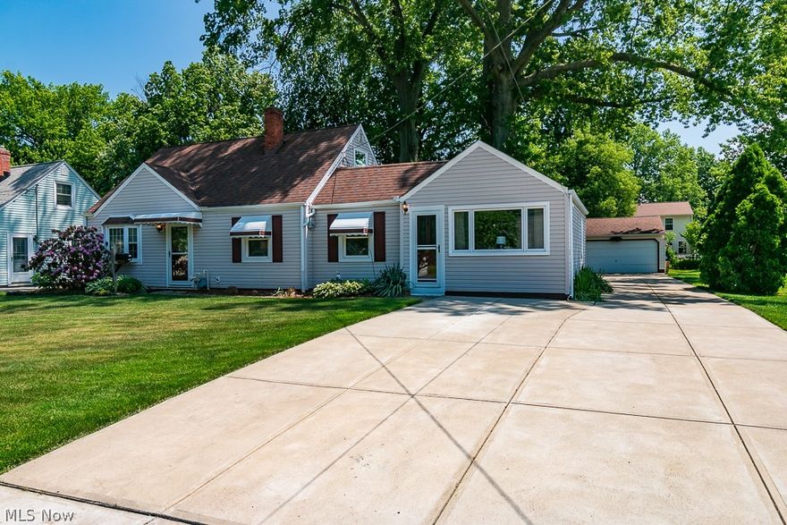 Location! Location! Location! This 3 bedroom home with an office or bonus room has many updates including furnace, hot water tank, windows and new extra wide cement drive. Home features large family room , living room and an updated kitchen.  Two bedrooms are on main floor and 3rd bedroom and office are upstairs. For the car buff there is an oversized garage -24' x 36' that is fully insulated and heated. Call today for your private tour.