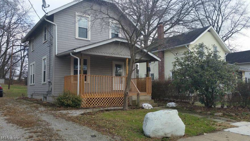 Update galore! Updates include flooring (carpet and vinyl), windows, interior paint, furnace, water heater, and front porch! Large back yard for your enjoyment, outbuilding.... plus nice quiet neighbor.