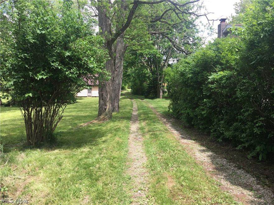 Value is in the land    -   City sewer and water   -     .4287 Acre   -   Very small home on site in rough condition  -   Great location just West of Five (5) Points, very convenient to all Tallmadge amenities  - Residentially Zoned    -   Front 75 feet    -  Back  80.32 feet     West(left) side 264.35 feet    East(right) side 235.61 feet     -   No delays to close     -      Sold As Is  Where Is           Nice Opportunity!