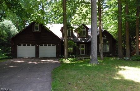 Welcome to this beautiful Cape Cod setting a Cul-De-Sac street and adjacent to Golf Course. This home features an elegant vaulted formal living room , spacious custom kitchen with vaulted ceiling, ceramic tile, and an ample supply of cupboards and counter space. 2 bedrooms and 2 full baths on the 1st floor, 2 cozy bedrooms and 1 full bath on the 2nd floor. The 1st floor master suite features a gorgeous brick fireplace, track lighting , master bath with sauna, tub and shower, and French doors leading to the back deck and wooded parklike back yard. The familyroom boasts a beautiful river rock peaked fireplace and extends to a gorgeous vaulted 4 season room with a wall of windows, sky lights, ceramic tile and an amazing view of the treed back yard. Brand New Boiler installed 02/2016 . The attached garage, cement drive and wooded lot add that perfect touch to your new home. This is a Fannie Mae Homepath property