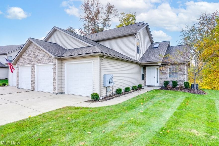 Enjoy low-maintenance living in this beautiful end-unit condo in the Pleasant Lakes subdivision. The spacious, bright, and open floorplan includes a large Living Room with Vaulted Ceilings, Skylight, large Radius window, and sliding door opening to a Deck overlooking a private wooded view of Plum Creek. The Main Level boasts gorgeous newer Hardwood Flooring (2019) throughout the living room and Eat-in Kitchen (w/newer microwave and garbage disposal) and includes a Bedroom and Full bath with walk-in shower. The Mudroom/Laundry area has a newer Water Heater (2022), Washer/Dryer (included in sale), and leads to the Attached 2-car Garage. Upstairs is Guest Bedroom with ample closet space and direct access to the shared Jack and Jill Bathroom. The Primary Bedroom is located on the rear of the unit and has a generous Walk-in Closet and Vaulted Ceiling! The entire unit has Newer Flooring/Carpeting and fresh Neutral Paint throughout (2019)! Landscaping, snow removal, and trash covered by the H