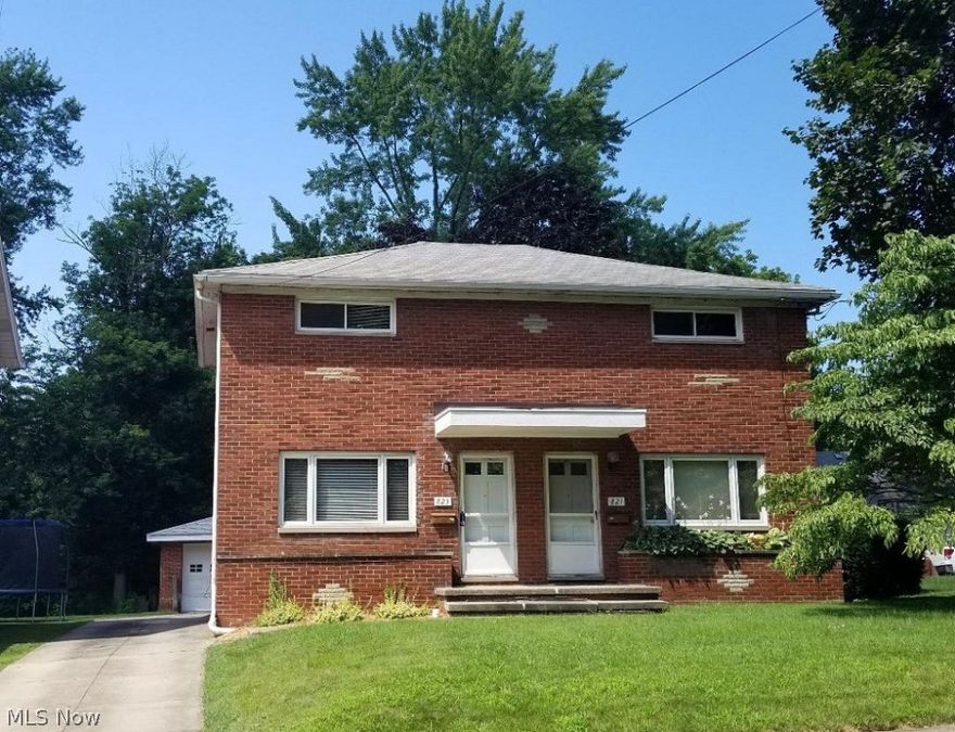 Charming and super well-maintained two-family in a great part of Cuyahoga Falls. Each unit has 2 bedrooms and one bath. Both units include appliances, feature beautiful hardwood floors as well as laundry hookups and separate storage areas in the basements. The property provides some great options, too. It’s a perfect opportunity to be an owner-occupant. One side is open and there’s a good tenant in place in the other. Maybe you just want a two family for portfolio enhancement. No matter which, you’ve got all of the bases covered here. Nice long, paved driveway and area in the back of the building for extra parking. True move-in condition. Improvements include: New chimney crown (2018),  New furnace and central air in both units (2014) Refinished hardwood floors in both units (2013 & 2012), Kitchen and bath remodel in 823 (2012) Electrical panels in both units (2010) Garage roof (2006),  New porch roof (2005), New vinyl windows in upstairs of both units (2005) and Andersen windows on th