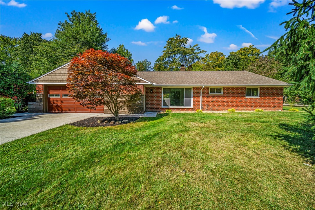 STUNNING, REMODELED Brick Beauty - 3 Bedroom 2.5 Bath Ranch* New White Kitchen Cabinets Opens To Dining Area And Family Room, Stainless Steel Appliances, Quartz Counters, Breakfast Bar, Wide Plank Luxury Vinyl Flooring Throughout * First Floor Laundry Room With Soaking Sink Ready For Your Stackable Washer/Dryer * Primary Suite With Private Full Bath And New Tile Shower * Living Room With Large Picture Window * Back Door Opens To New Concrete Patio Overlooking Lush Landscaped Parcel * Newer Replacement Windows Throughout * New Electrical Panel * From The Moment You Step Inside, You'll Appreciate The Open, Modern Design And Quality Finishes * Every Detail Has Been Thoughtfully Remodeled By A Professional Contractor * Attached 2 Car Garage * Turn Key And Move In Ready! Call For A Private Showing Today! Remember To Check Out The Virtual Tour - Check It Out...Open House Sunday, September 14th 1:00-3:00, Stop In
