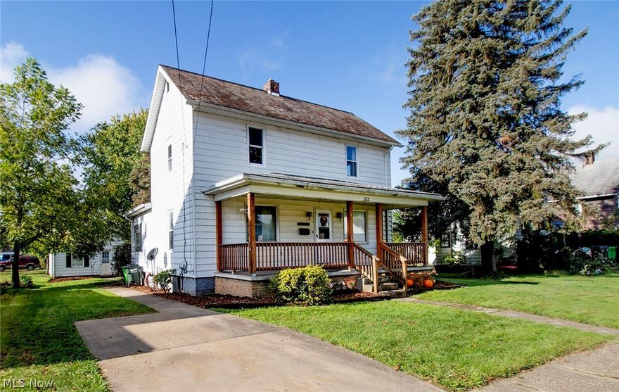 Move in ready two bedroom home with a nice large kitchen and hardwood floors and a two car garage. 
Enter the home from the rear into the mudroom and you will step into the roomy kitchen.  You will also find a living room, and dining room and also a 1/2 bath.   Upstairs  is where  you will find the two bedrooms and a full bath.  Enjoy life on the spacious front porch.  Make your appointment today to see this home.