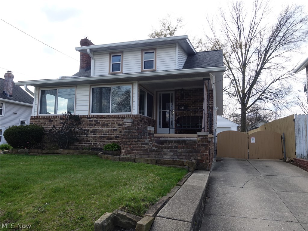 This property is full of character and charm and is on a dead end street! Enjoy the spacious living room with fireplace, all season sun room, updated kitchen and full bath, family room with barn door and sliders to awesome, huge deck. There are 3 fireplaces in this home (living room, kitchen area, and recreation room). The recreation room is amazing with an awesome wet bar, fireplace and half bath. The backyard is really nice with the huge deck, 2 car garage and covered patio off the garage - perfect entertaining space. Updates include: Kitchen cabinets, granite counters, sink, faucet, garbage disposal, light fixtures - 2016; AC - 2015; Furnace, Hot Water Tank & Windows - 2014; barn door, garage door and door opener & baths - all updates done 2015 - 2019. Close walk to Goodyear Heights Metro Park. Ellet schools.