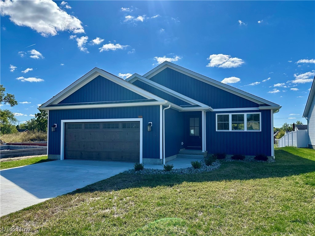 NEW CONSTRUCTION! Experience the perfect blend of modern elegance and functional design in this stunning newly-built ranch home. With a beautifully designed open floor plan boasting seamless flow from room to room, the interior is bathed in natural light from large windows and the neutral color palette enhances the airy ambiance. The crisp white kitchen boasts a generous center island, ideal for casual meals or entertaining, complemented by a dedicated dining area and a spacious living room with access to the covered patio. It's the perfect space for al fresco dining or relaxing on warm evenings, making this home a true sanctuary for large gatherings or cozy nights in. Retreat to the primary bedroom, thoughtfully designed with a walk-in closet and a luxurious attached bath that features dual sinks and a custom shower, offering a perfect escape at the end of the day. Additional highlights include two well-appointed bedrooms and a guest bath, making it comfortable for loved ones or visitors. The main level laundry room adds an element of practicality, while the full basement has roughed-in plumbing for future customization, if desired. With its modern navy blue vertical siding and bright white accents, the curb appeal here is undeniable. Best of all, this home is nestled in a desirable location close to amenities yet tucked away on a quiet cul-de-sac—perfect for those seeking comfort, style, and convenience in one fabulous package.