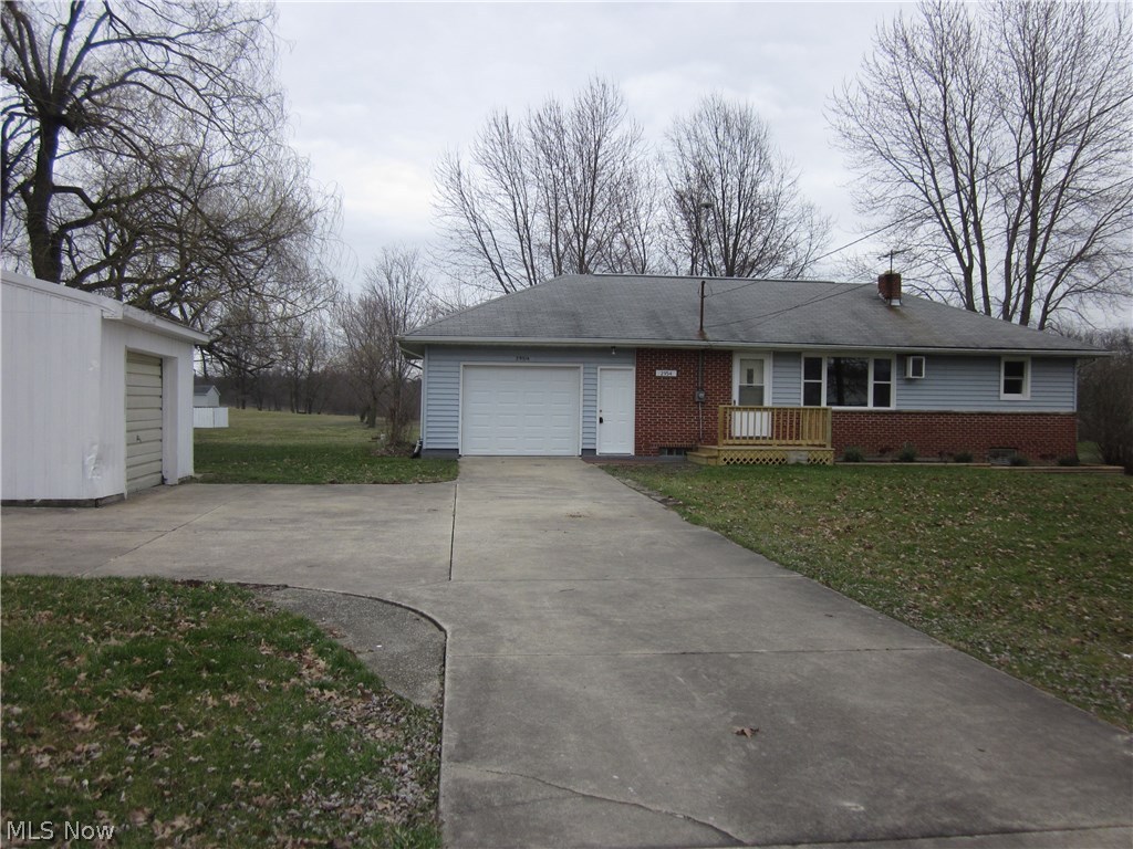 MOVE RIGHT IN and start to enjoy this remodeled ranch. Many updates including new windows, door, garage door, counter tops, bathroom fixtures... and the list goes on and on. Relax and enjoy the view from the cozy sun room. Lots of storage areas including full basement and a 16 x 24 detached garage on over a 3 acre lot. MUST SEE!
