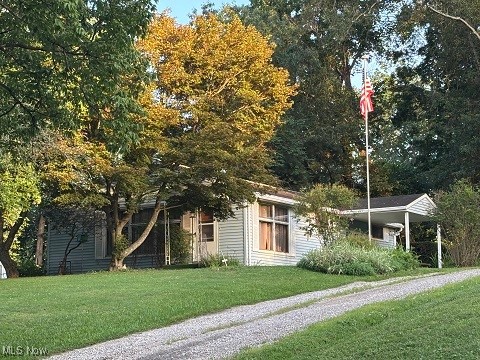 Check this home out that features 3 bedrooms and 1 full bath with a full basement that could easily be finished and has a B-dry system that transfers to the new owner. Enjoy watching nature on the covered patio as the deer and other wildlife like to play in the .62-acre yard! Laundry is in an upstairs bedroom but can be moved back to the basement. This home sits outside the village limits but is close to all the amenities. Roof was replaced in 2010, new furnace and central air in 2024, new sewer line in 2012. Maysville LSD. Call your favorite Realtor for an appointment today!