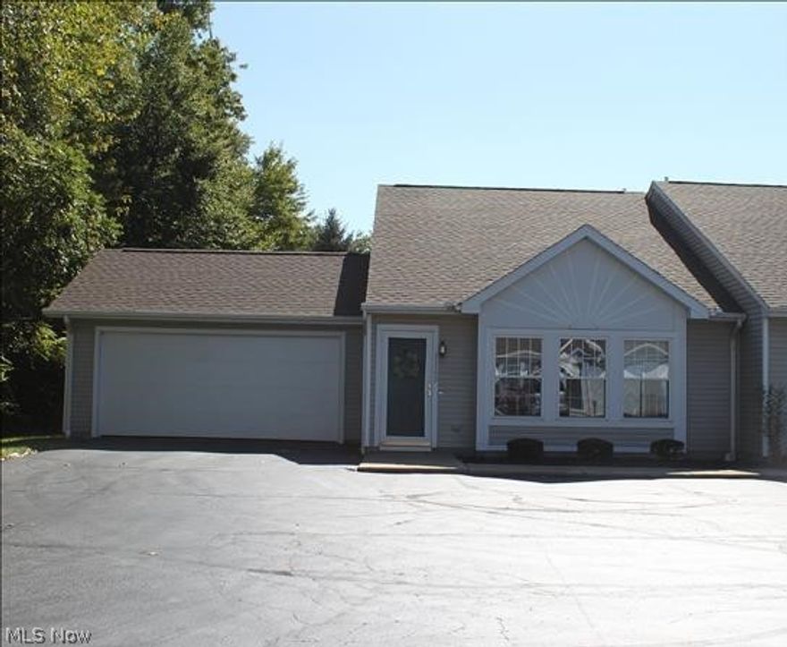 This is a gem! All new appliances including washer & dryer. New hot water heater, 12 x 12 patio w/privacy fence, wooded view. End unit with 2 car garage