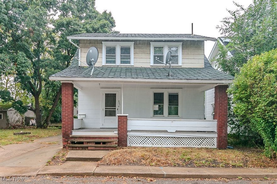 This 3 bedroom, 1 bathroom century home showcases timeless craftsmanship with beautiful woodwork, built-ins, and hardwood floors throughout. A classic floor plan includes a living room where the fireplace is flanked by bookcases, adding warmth and character to the space. The dining room flows into a bright kitchen, while an attic provides extra storage. Updates like an upgraded electric panel and refreshed bathroom fixtures give peace of mind without taking away from the home’s character. Conveniently located near shopping, downtown Canton, and Cleveland Clinic, this home blends historic charm with modern touches in a great location. Schedule your tour today!