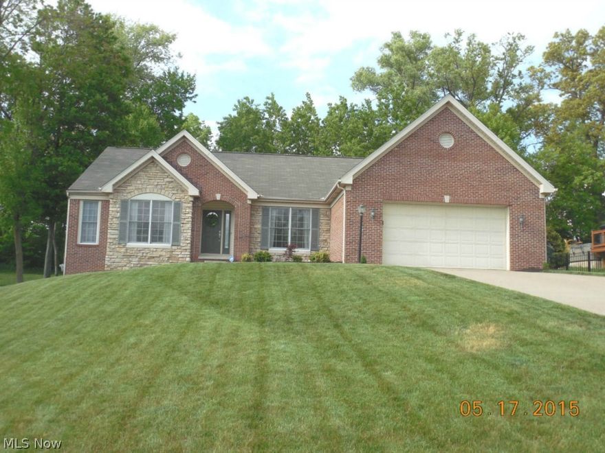 Absolutely stunning ranch home!  The open floor plan includes a formal living room (currently used as an office), a formal dining room.  The spacious family room with gas fireplace and built in book shelves overlooks the 700+ sq ft Trex deck and private back yard.  There are solid Brazilian Redwood floors throughout (50 year guarantee). The kitchen includes an island, large eating area and all appliances. The master suite has a wall of windows overlooking the deck.  The master bath features a jacuzzi style tub, double sinks and huge walk in closet.  First floor laundry.  The lower level is finished with Allure flooring, a fourth bedroom and third full bath!  This home has been lovingly cared for and improved upon by the owners.  Home warranty is also offered.  Don't miss this beautiful home.  Call today to schedule a private viewing.