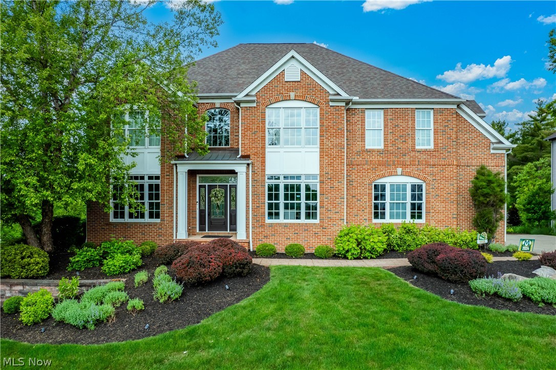 Welcome to this stunning residence in the Blue Heron Community that boasts 3,800 square feet of luxury living space, complemented by a 1,500 square foot walkout basement. With 4 bedrooms & 4.5 baths, this entire home was updated with comfort and elegance in mind. A gorgeous kitchen centers the home and is complete with a butler's pantry, dinette area, and a cozy hearth room—perfect for impressing and entertaining guests. Each of these areas has been modernized with new light fixtures, fresh paint on the walls & trim, and stunning wood floors that travel seamlessly into a spacious two-story family room. For more formal occasions, enjoy the elegance of the formal dining room. Working from home? Take advantage of the convenient office with custom built-ins and french doors for added privacy. Walk up the dual staircase to the second floor, where the primary suite is a true retreat. Vaulted ceilings and a fireplace create an inviting atmosphere, while the luxurious bathroom features a glass-enclosed shower, a corner soaking tub, extra-large vanities & a skylight. The huge walk-in closet with organizers ensures ample storage for your wardrobe. Two of the upstairs bedrooms share a well-appointed Jack and Jill bathroom and offer generous closet space. An additional bedroom serves as a guest suite with its own private bathroom. The expansive walkout basement features a wet bar, rec room, full bathroom & ample storage space. Step outside to a beautifully landscaped yard with mature trees that offer privacy and a serene environment surrounding the patio and trex deck. Living in the Blue Heron community means access to fantastic amenities, including swimming, tennis, and the Blue Heron Brewery and Event Center, ensuring there's always something fun to do. Don't miss the opportunity to own this exquisite home in one of Medina’s most sought-after communities. Come see today!