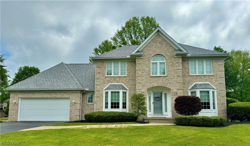 It’s tough to get any better than this! Welcome to this Howland one owner custom home featuring an elegant brick façade on nearly half an acre. This 4 bed, 2.5 bath residence offers space and luxurious living.
Step into a large foyer that sets the tone for the rest of the home. The dining room, adorned with a tray ceiling and beautiful bay window, is perfect for hosting special gatherings. The living room also features a bay window, allowing natural light to flood the space and offering a charming view. The large eat-in kitchen features stainless steel appliances, large pantry, center island & custom Merillat wood cabinetry. A slider opens to a big composite deck, perfect for outdoor dining and entertaining. The large family room features a cozy fireplace and plenty of windows, offering a warm and inviting space for relaxation.
Convenience is key with a generous half bath & laundry room completing the first floor. 
Upstairs, master bedroom is a luxurious retreat with a private en suite bath and a huge walk-in closet. Three more generously sized bedrooms, all with large closets, along with a sizable main bath, provide ample space for the entire family & guests. 
The dry basement area includes glass block windows, sump pump, & plenty of storage. and offers additional space that can be finished to suit your needs. The property also includes an oversized two-car garage, providing ample space for vehicles and extra storage.
Freshly landscaped and pressure washed, this wonderful residence seamlessly combines luxury and functionality, making it perfect for modern living and entertaining. Enjoy the serenity and space this Howland property offers, and make it your own.