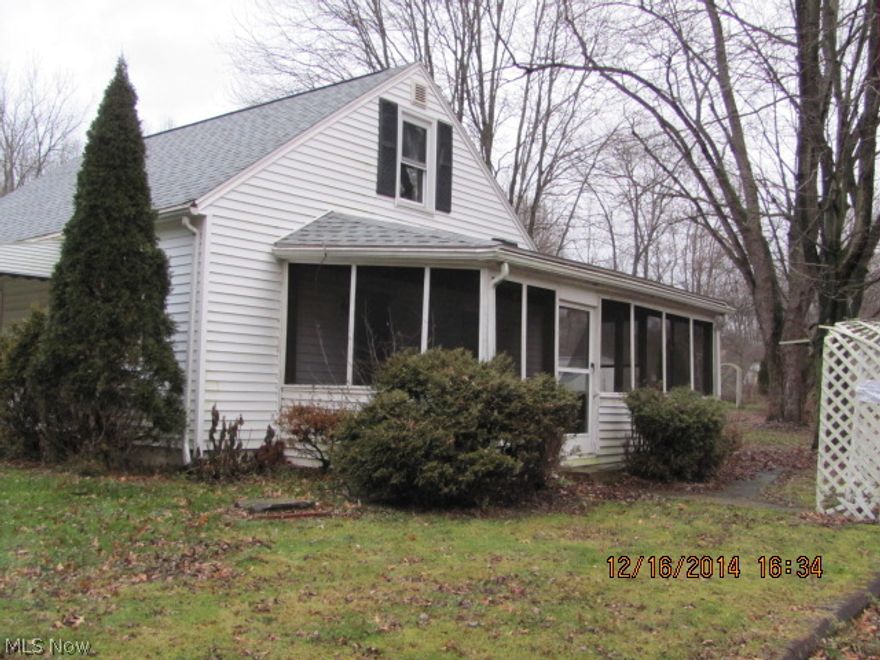 Three bedroom, 1 bath cape cod with an oversized two car garage.  Handy to shopping and restaurants.