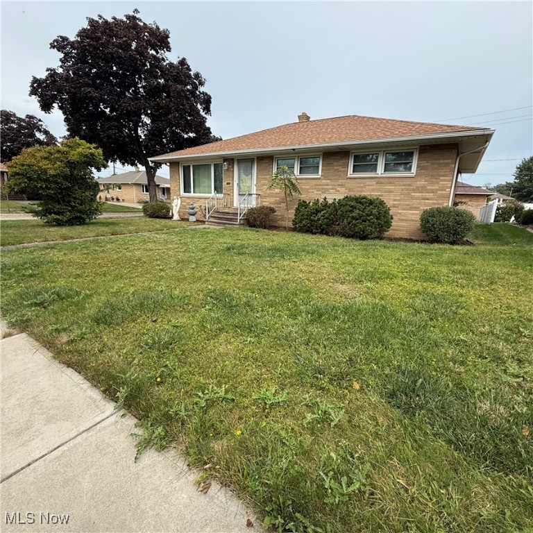 Lovely 3 bedroom brick ranch in desirable Brooklyn. Large, welcoming living room with cove ceilings. Spacious kitchen, tons of counter and cabinet space. Open concept basement, with built in bar, perfect for entertaining. Newer windows, newer electrical system! Come and look!