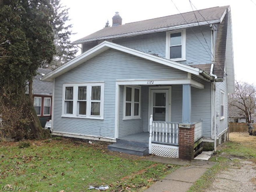 Affordable living in North Hill!  This cute Dutch colonial styled home is one of the least expensive on the market today!  The bath is modern and the galley style kitchen has some updated cabinets.  There are a few updated vinyl windows.  There is a full sized living room and a full sized dining room along with a separate area that is good for an office.  There is also a semi-finished paneled basement room which has been used as a 4th bedroom.  This house has not been vacant for very long.   It was tenant occupied up until August 2018.   Call now to see what you can do here!   Paint and carpet will go a long way toward making this house a cozy home!  Electric is currently not on - bring a flashlight for basement areas!  Appliances are in unknown working condition. **** Buyer must pay the $150 listing agency management fee. *****