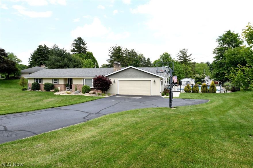 A vacation paradise right at home! This beautiful home offers so much. At first you will notice the custom inground swimming pool with an amazing entertainment area. If you choose you can walk across the enormous deck overlooking the pond and sprawling backyard. Then step inside and you will see tons of updates. Newer granite counters with custom cabinets. New paint throughout. Large master suite with sliding glass doors to the rear deck. The beautiful living room offers a custom brick fireplace for those cool winter evenings. Downstairs you will find a partially finished walkout basement. Set up currently as a family room, a gym and entertainment area. With 3 bedrooms and 3 baths you will not want for more.  Do not miss out on viewing this one.