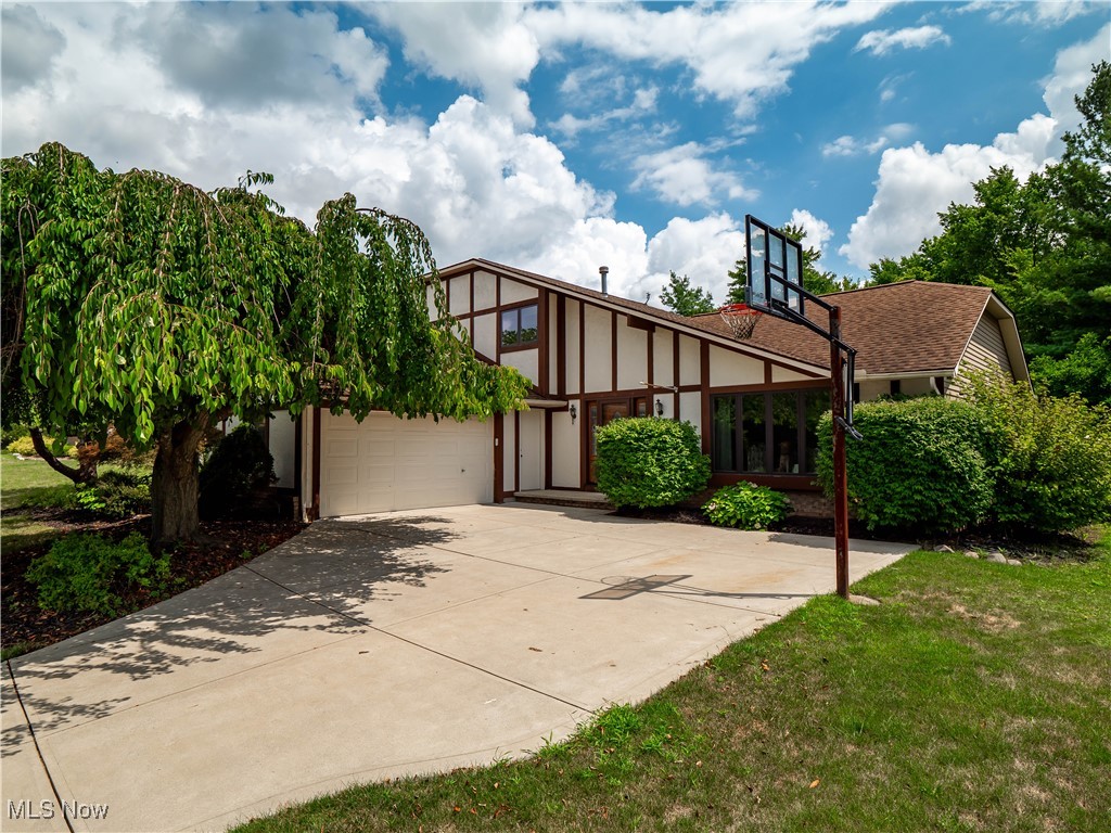 You don't want to miss out on this 4 bedroom 2.5 bath home in the Pine Lakes subdivision of Strongsville. This home has been beautifully redone with neutral colors and finishes throughout. Notable updates include: oven/range 2019, furnace/A/C, and hot water tank 2021, garbage disposal 2022, kitchen cabinets and countertops 2022, half-bath, kitchen cabinets, countertops, laminate flooring, carpet, and baseboards 2024. A home office or 4th bedroom on the first floor for your convenience. The basement is partially finished with an area for an additional living space and an area with plenty of space for extra storage. A nice paver patio and a fully fenced backyard make the perfect spot for relaxation/entertaining. Centrally located by shopping schools, dining, and more! Schedule your private showing today!
