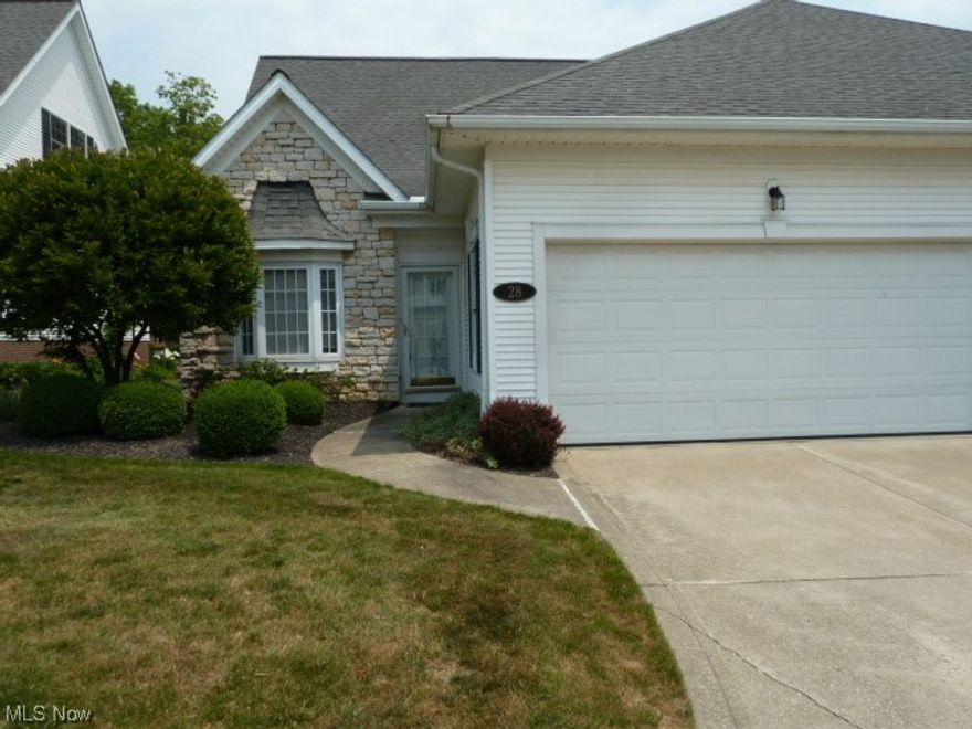 Ackerman Built 2 bedroom 2.5 bath end unit located in the "Preserve At Gullybrook". Gated community, minutes from I-90 and only 20 minutes from downtown Cleveland. Features include an eat-in kitchen with granite counters and  breakfast bar, first floor master and bath with whirlpool tub and shower. Hardwood floors, vaulted ceilings, loft, gas fireplace. (Can be easily converted back to original plan as a 3 bedroom)