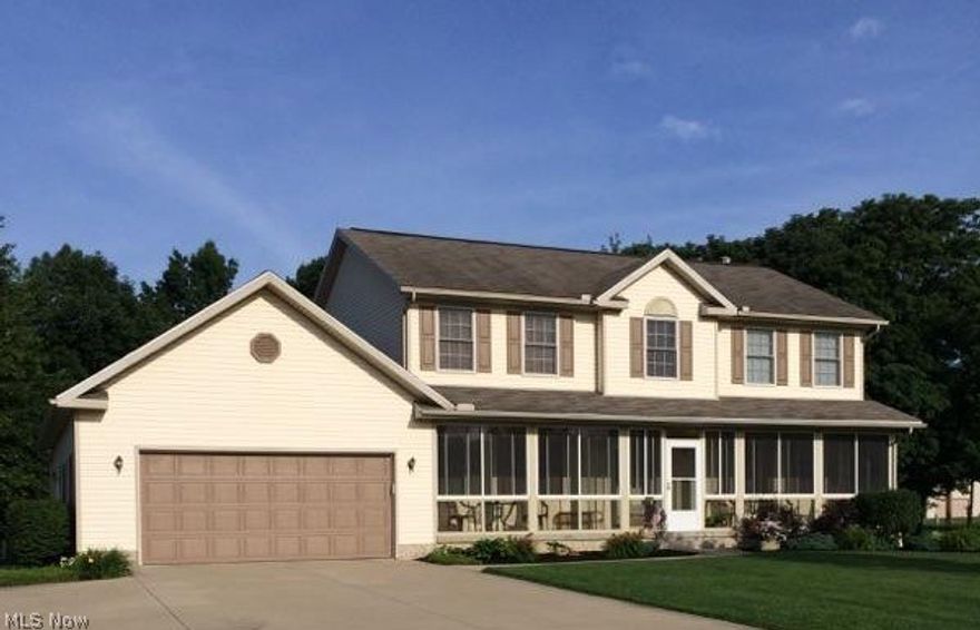 Spectacular Colonial is impeccably kept and ready for you to enjoy.  Decorated in subtle grey tones,  this 4 bedroom 2 full 1 half bath home  has been updated to perfection.  The large eat-in kitchen offers Quartz counter tops, stainless steel appliances, and laminate flooring. The family room with wood flooring and gas fireplace plus a formal living room and dining room make entertaining a must!  A convenient first floor laundry and updated 1/2 bath are also featured on the first floor.  The second floor offers 3 large bedrooms with ample closets plus an amazing master suite that boast bamboo flooring, a barn door that leads to the master bath that features an elaborately tiled shower and and a gorgeous jetted tub. The exterior of the home has even more to offer.  Watch the sun rise on the enclosed front porch that spans the length of the home, or enjoy the evening sunset from the patio that overlooks the pristinely manicured back yard.  Store your outside extas in the storage shed. T