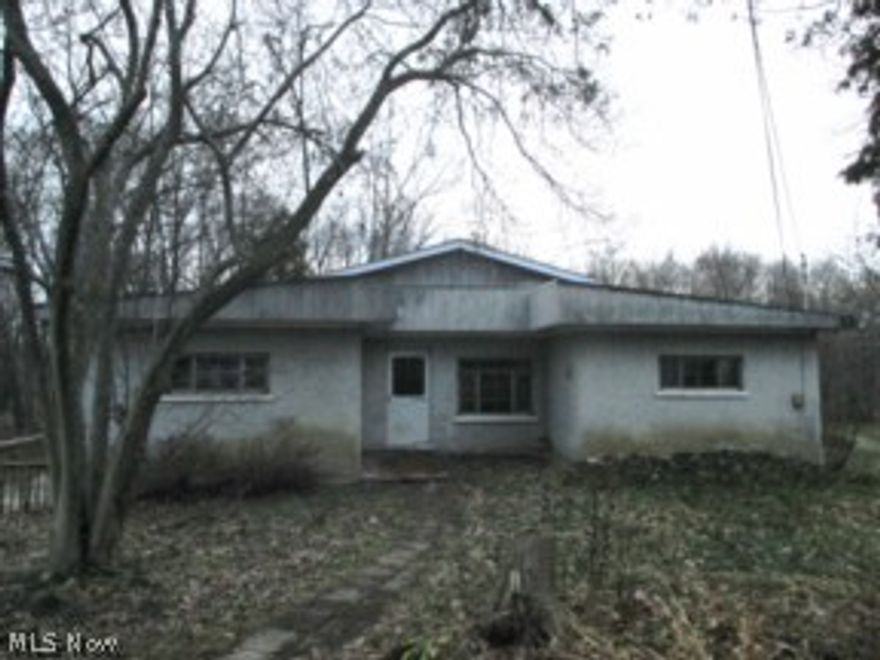 3 bedroom home located on 3 acres of land with a private pond