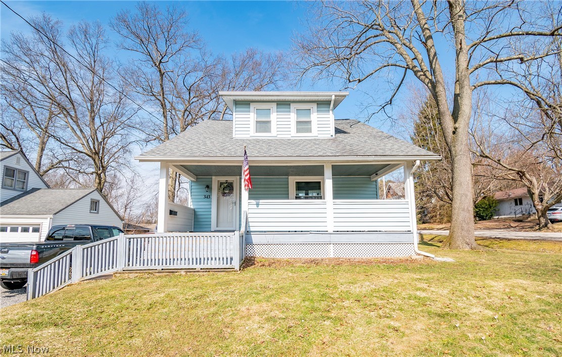 Welcome to 343 East Central Ave! You don't want to miss this cozy cape cod sitting on a quarter acre corner lot! This home offers 3 bedrooms, 1 bathroom, an extensive back yard and a large front porch where you can enjoy your morning coffee! Enter into the foyer and continue into the welcoming living room boasting loads of natural light. Dining room provides access to a spacious deck overlooking the oversized backyard. The kitchen and large first floor bathroom with double sink vanity round out the main level. Beautiful wood plank flooring throughout main level and newer carpet throughout upper level. Full basement providing ample storage space and laundry area. Don't miss your opportunity to own this home. Schedule your private viewing today!
