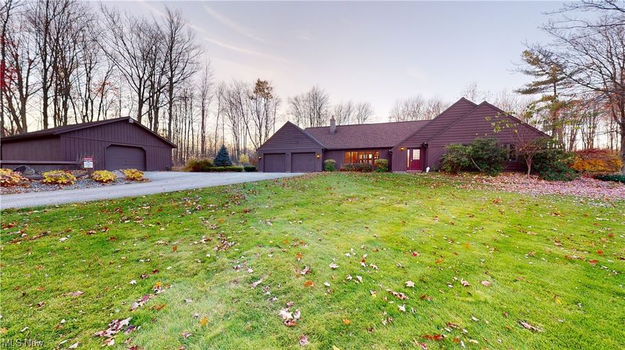 Beautiful large home situated on a parklike yard sits back from the road and has a large barn. Home was originally a 2 Bedroom ranch and the owner added a huge addition including a second floor bedroom and sunporch.  The 2 story great room has a wall of windows and a stone wall wood burning fireplace.  The kitchen is a chefs dream with lots of countertop space, high end stainless appliances, title backsplash and a butlers pantry.  Family room has a wet bar and custom built in desks . This home has been very  well maintained and is ready for a new owner to enjoy country living with close access to the highway.