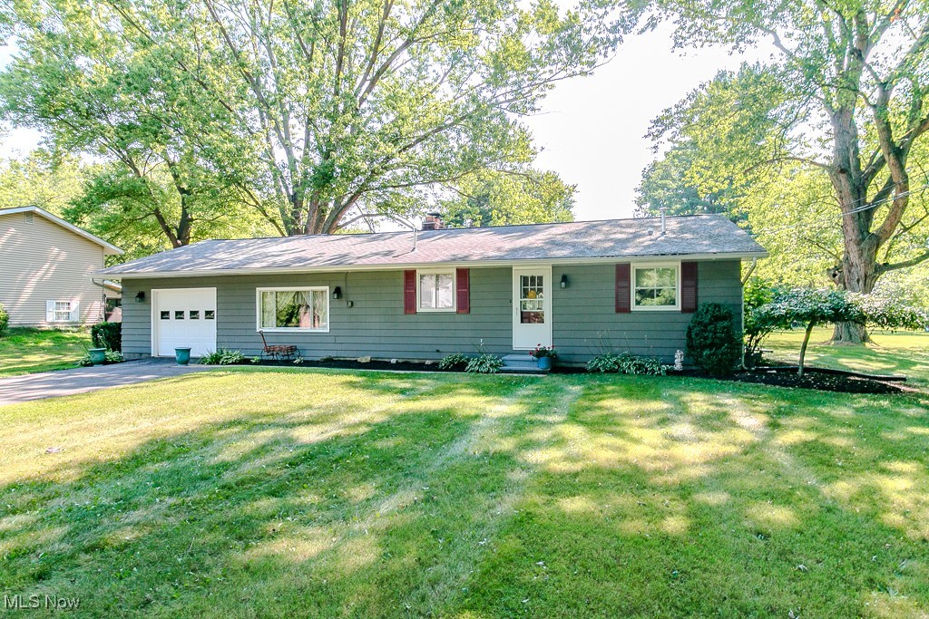 This well-loved and well taken care of 3 bedroom 1 1/2 bath home is waiting for you. The home is on .75 acres located on the Geneva/Madison border on County Line Rd. it is just minutes from stores, restaurants, and many of the fun things there is to do in Madison and Geneva (including Geneva on the Lake and Spire Institute). Entering the front door, to the right is a full bath with a square soaking tub and shower combo. Continuing down the hall, are two nice sized bedrooms. The large living room boasts a wood burning fireplace. There are also 2 sliders accessing the screened-in sun porch that overlooks the spacious back yard. The gally kitchen has a stove top and wall oven. There's also a desk that allows you to peek into the living room as you work. Through the kitchen, is a formal dining room with built in drawers and 3 storage closets. Beyond the dining room is a large laundry/utility room. The third bedroom is tucked behind the utility room and has a private half bath that is actually a shower and toilet. The bedroom has a little alcove that is currently being used as a closet but could be used as a reading area. Be sure to make an appointment to
see this home soon as it won't be on the market very long.