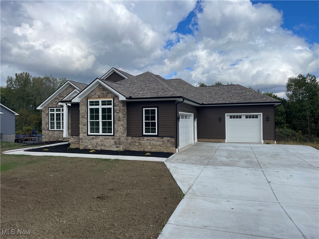 Concrete has been finished on this BRAND NEW HOME,sitting on an acer of land.Impressive new biuld is ready for a family. Quality Care Construction now building new homes in North Canton! Treat yourself to a spacious, open-concept home conveniently close to the best of shopping, dining and entertainment venues. Ideal location in one of Ohio"s most sought-after communities Main floor is 2700sq ft lower level 2539 sq ft front porch 117 sq ft rear porch 379 sq ft garrage 1133 sq CONSTRUCTION IS COMPLETE!!!