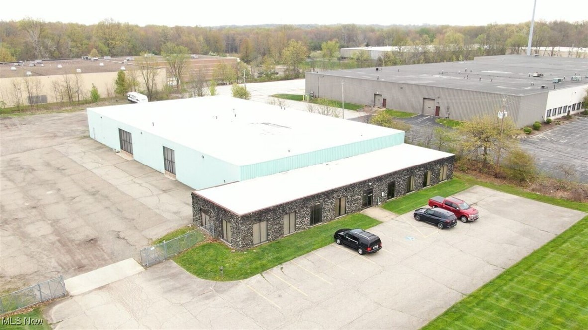 100% occupied NN lease industrial property offered at well below replacement cost. Prime NEO location only one mile
from I-480 and three miles from I-271. This location offers ease of access to Cleveland and Akron markets. Both flat roofs
were resurfaced in 2022 with cost exceeding $215,000. Class B buildings sited on an estimated four acres. Each unit has
at least one drive-in bay and two docks with levelers. Public water & sewer present and in use by tenants. Masonry block
exterior construction. Approximately 50,000 SF of onsite parking. Average unit size of 10,000 SF. Each unit has
combination of warehouse and office space. Office spaces range 1,700 SF to 2,100 SF. Warehouse space for each unit is
approximately 8,500 SF. Upgraded lighting with clear height ceilings of approximately 16.5 FT. Electric heat in office
spaces and gas powered reznor heaters in warehouse spaces.