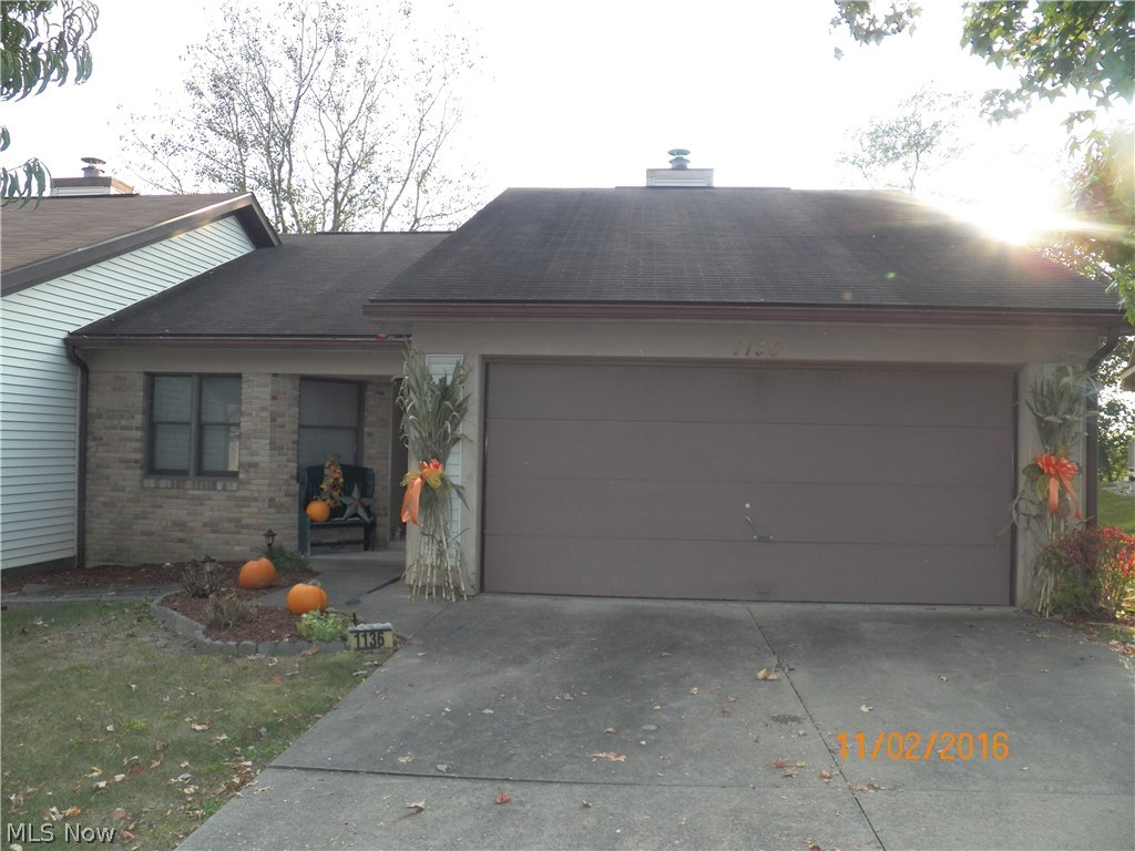 Move in ready 2 bedroom, 2 bath condo at The Bluffs at Colony North. Freshly painted interior. Gas fireplace in the living room. Two car attached garage. Nice back deck with access from the living room.