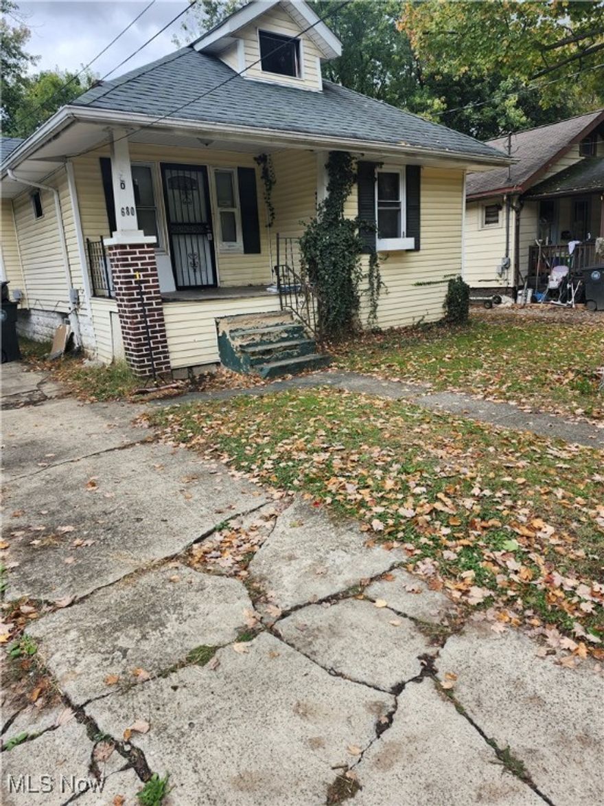 VERY spacious 2 bedroom home, needs a new owner!  This 2 bedroom, 1 bath home,  is situated on a nice size yard and has a FULL/WATERPROOFED basement!   This home has vinyl siding, many NEWER vinyl windows, a NEWER hot water tank, and added space in attic for a kids play area/extra bedroom!   There is a small patio in the rear of the home!  This home has a ton of storage and ENDLESS POSSIBILITIES!!!!    Being sold AS IS.