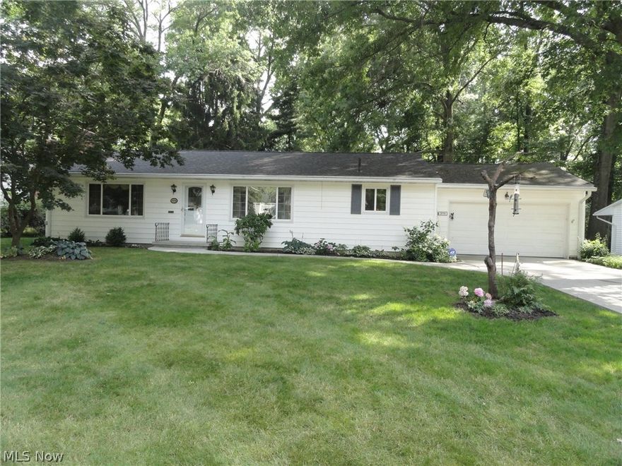 Charming ranch situated on lovely large lot in Silver Lake Village. This home has been nicely maintained and updated. Beautiful hardwood floors throughout every room on the first floor. Spacious living room and dining area with 2  large picture windows welcoming the sunlight. Crown molding and wood burning fireplace too all open to the dining area and gorgeous new kitchen with custom white cabinets,  granite counters and new stainless appliances. 3 spacious bedrooms, a full bath on the first floor with double sinks and a second full bath in the lower level adjacent to the huge rec room with another wood burning fireplace.  Screened sun room plus an over sized patio overlooking the lushly landscaped and semi private backyard. The third bedroom is the access to the sun room.   Updates include all doors, windows, trim, lighting,some electric,tankless water heater,  concrete driveway, newer roof and more! Potential to join Crystal Lake Swim Club  with an annual fee where you can swim, fish