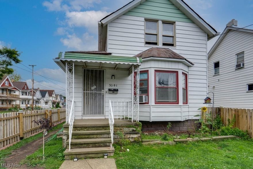 Looking for spacious living with a bedroom on the first floor? Look no further. This 1900s cape cod has all the space you'll need for simplistic living and is located in a hot up and coming area that's just a brisk walk away from Metro Health Hospital. As you pull up, you'll notice the picket fence that outlines the home. Your front yard will provide amazing yard space to garden and sit on the porch on those hot summer nights. You'll enter through the side door that has its own porch also and is right next to the detached garage with an extra parking space on the side. Walking in you'll be greeted by a little foyer area that gives you the option to go in the basement, one of the bedrooms or into the large eat in kitchen area. The bathroom, formal dinning and large living room are adjacent. In need of more space? Up the stairs you will be greeted by two additional tandem bedrooms with a large closet/storage space. All it's awaiting on is your cosmetic touches and Y-O-U. Schedule your showing today, this home is priced to sell and will not last long!