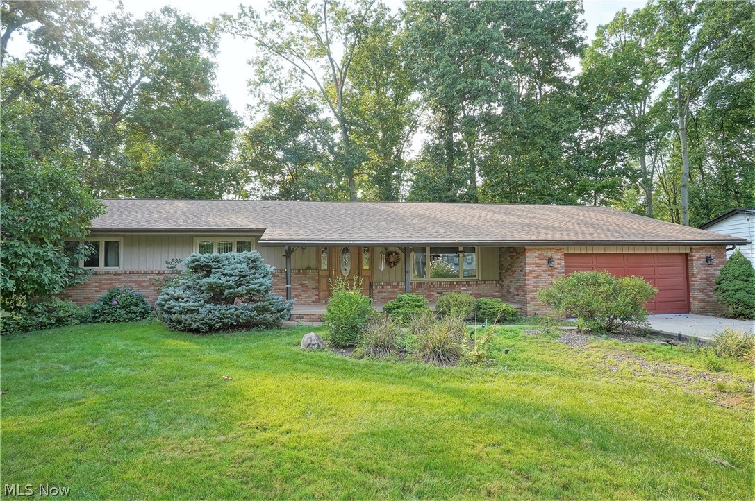 Looking for a spacious ranch in the Revere school district? This brick and cedar home offers over 2,000 sq. Ft on the main level, a 13x8 foyer leads to the step down, spacious living room, attached formal dining room, family room with corner brick fireplace, vaulted ceiling and skylights. Off the family room is the 3 season Sun room overlooking the large back yard. There is also an eat-in kitchen with built-ins and half bath. The two car garage enters right near the kitchen with direct access to the basement level. There is a large, 48x14.6 finished side of the basement with bar area and an equally large unfinished side for great storage. A nice large master bedroom offers an updated bathroom and large walk-in closet, two other bedrooms have good closet space. Water heater- 2018, newer windows approx 5 years.