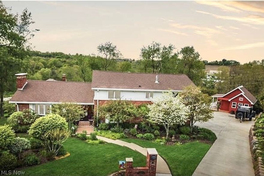 This Luxurious 3698 sqft home blends an array of sleek finishes & thoughtful floor plan. The home offers the open concept design with a stunning brick fireplace serving as the focal point.The dining room, kitchen and sitting area flow together maintaining a graceful separation of living space.The kitchen is a chef’s delight,customized granite and suite of high-end stainless steel appliances from Wolf and Miele with a Sub-zero fridge. With extensive and impeccable renovations,The house has been completely outfitted with high quality materials including maple and walnut finishes, new lighting, home smart automation system.The multilevel home was updated with a massive addition in 1998 which includes a stunning living area with a duel sided fireplace.This level features a spa room with a built in bath Jacuzzi, dry sauna,steam room,full bath complete with body shower. Off the spa area is a theatre with 7 seats. This level also features the laundry room, 2 car garage & half bath. A custom spiral staircase leads downstairs to an office or bonus room complete with a walkout to the landscaped grounds,and outdoor gas fire pit. The main bedroom boasts maple built-ins, speakers & a fireplace.Features include an en suite full bath with heated floors,heated towel rack, speakers, and a luxurious steam body shower. The original basement is finished with stunning built ins, full wet bar and a 5th gas fireplace.The grounds are arrayed with multiple levels of landscaped flowerbeds & trees.