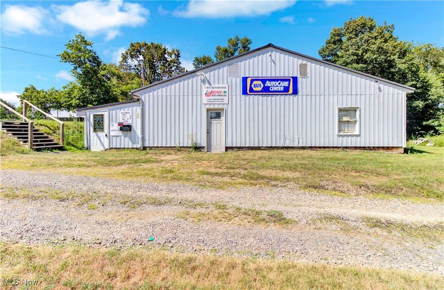 Prime commercial opportunity on over 1.5 acres, ideally located just minutes from both Carrollton and Malvern.  This versatile property offers a spacious office area along with 40x50 garage - perfect for a wide range of business uses.  With men's and women's restrooms already in place and plenty of extra land for expansion, storage, or parking, the possibilities are endless. Building was used as a mechanics shop for the last 11 years using mid-rise lifts.  Current garage door has a 9 foot clearance.  Rafters could be opened up to the attic to allow more ceiling space.  The land behind the building gives room for additions to the current building.  Driveways on both sides of the building are an extra bonus for future ideas!  Whether you're starting a new venture or growing an existing one, this location offers convenience, visibility, and room to grow.  Don't miss out on this rare opportunity!