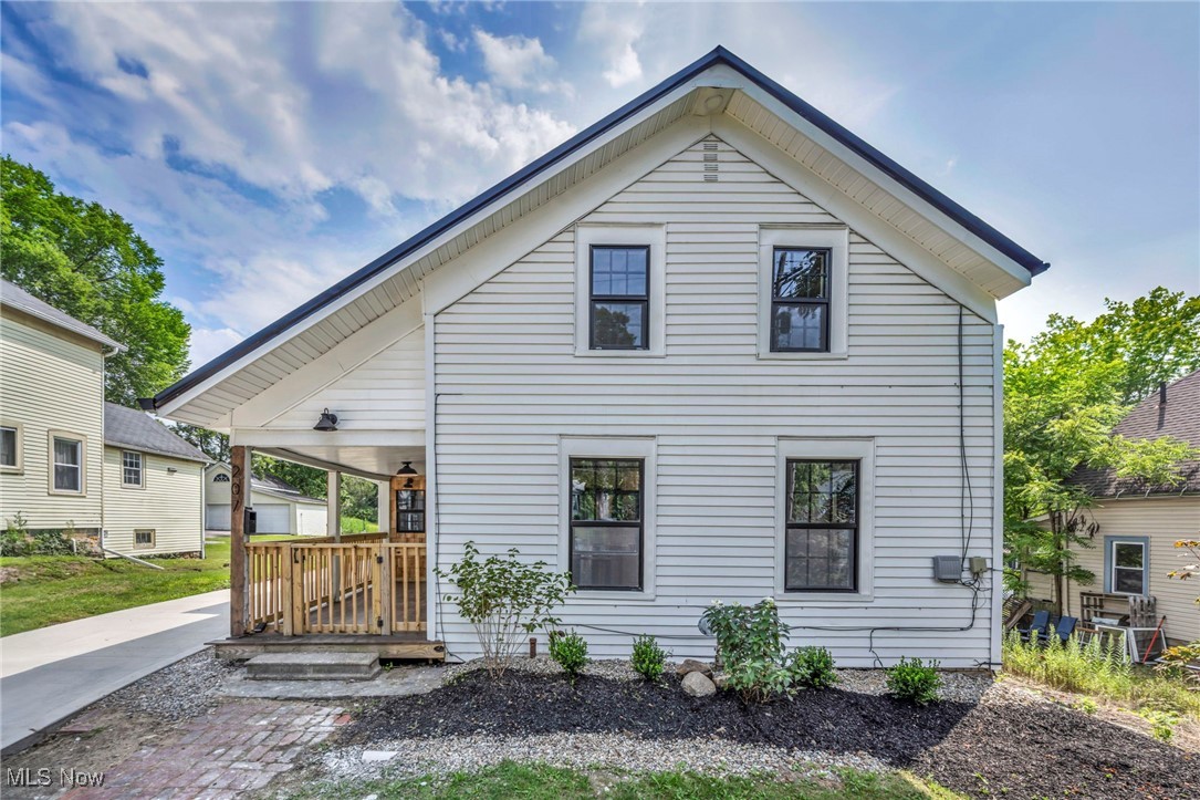 Don't miss this stunning, fully renovated colonial century home located in walking distance to Chardon Square! This meticulously renovated 3-bedroom, 2.5 bathroom home offers the convenience of first floor living with a spacious master suite, half bath, as well as a laundry room with a new washer/dryer on the main level. The fully remodeled kitchen has been equipped with new cabinetry, fixtures, and new premium LG stainless steel appliances. Entertaining is a breeze with the large dining room and living room spaces. To keep that cozy feeling of a Chardon century home, you will love the beautiful, aged original doors and hardwood floors that flow throughout, preserving the home's authentic character while complementing the fresh, contemporary updates. Upstairs there are two large bedrooms with walk in closets and an another fully renovated full bathroom. Additionally, this home features updates that include a brand-new metal roof, new energy-efficient windows, new central air conditioning, new hot water tank, new covered side porch and a new cement driveway. All plumbing and electrical have been completely replaced throughout the home during the renovation, ensuring peace of mind for years to come. As a final touch, the storage shed with porch will make a great place to grill and enjoy the property. This rare find combines the walkability and charm of Chardon's historic downtown with the comfort and reliability of a completely modernized home. Don't miss this opportunity to own a piece of Chardon's character in fully renovated, move-in ready home!