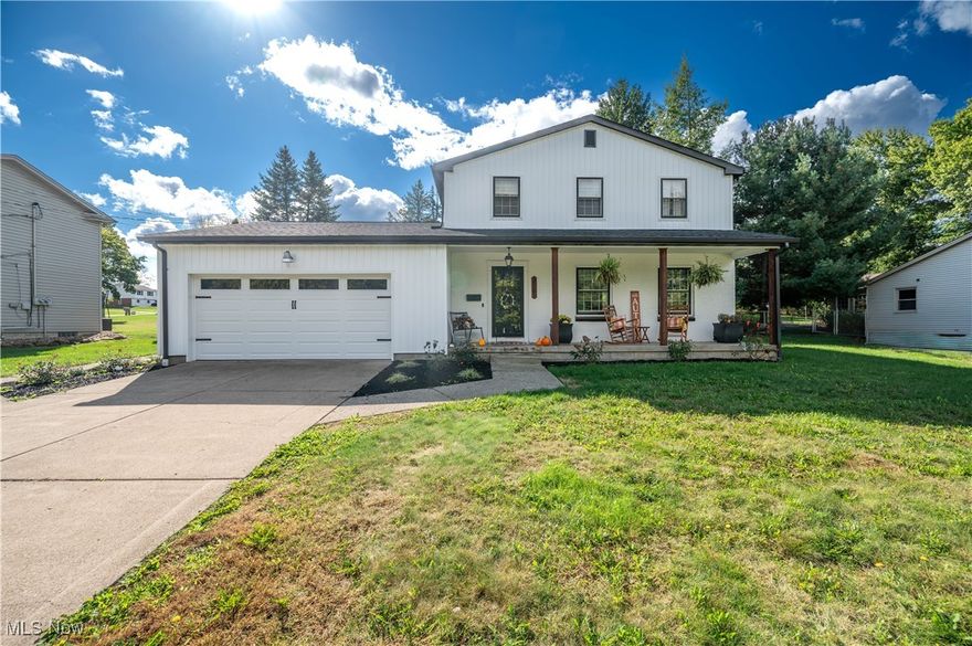 This gorgeous two-story home is set on a quiet street in a desirable Poland neighborhood and offers the perfect blend of timeless character and modern updates. With 1,720 square feet of living space, three bedrooms, one and a half baths, and multiple gathering areas, this property is designed for both everyday comfort and entertaining.

Curb appeal stands out with newer vinyl siding accented by Craftsman-style details, brand-new exterior and garage doors, a newer roof, and a cozy front porch for relaxing outdoors.

Inside, hardwood floors run through much of the home, including all three upstairs bedrooms, each with generous closet space and abundant natural light. The main bath has been tastefully updated, while a convenient half bath serves the first floor.

The eat-in kitchen features newer luxury vinyl floors, ample counter space, and updated appliances that stay. It opens directly into the family room, anchored by a striking stone fireplace. A spacious living room and formal dining room, both with hardwood floors, provide additional options for hosting.

An inviting all-season room overlooks the backyard and adds versatile living space to enjoy year-round. The large lot includes a patio and shed, offering room to spread out and entertain.

Additional highlights include a full basement with laundry and storage space, central air, and a spacious attached two-car garage with opener. This meticulously maintained home combines charm, tons of updates, and a wonderful location! Schedule your showing today!
