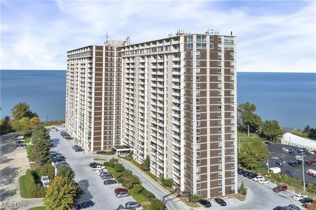 Rare opportunity to own a completely renovated PENTHOUSE unit in the highly sought after Carlyle building located along Lakewood's "Gold Coast." PH #17 is a 2-bedroom, 1.5-bath, two-story condo offering sweeping views of Lake Erie and the surrounding neighborhoods — your own private retreat in the sky! The current owners have spared no expense remodeling this unit over the last four years...The galley style kitchen includes granite counters, breakfast bar, stainless steel GE appliances, new cabinets, and new light/faucet fixtures. Half bathroom on main floor includes chic vanity with granite counters - the full bathroom upstairs has been upgraded with new shower liner and shower door, vanity with granite counter, and stylish mirror/light fixture. Both spacious bedrooms include sizable closets, sliding doors leading to balcony, and "black out" blinds. Fresh paint and vinyl flooring throughout. A truly "turnkey" condo! The Carlyle is known for its amenities; 24/7 front desk & security, "hotel-like" lobby, conference room, party/game rooms, personal and bike storage units, 2 pools(indoor & outdoor), hot tub, locker rooms with dry sauna, fitness center, racquetball court, laundromat, in building deli market, and hair salon... Year round views and access to Summer Place and Pier W restaurants within minutes! Come experience the "Carlyle lifestyle" and all the Gold Coast has to offer - in your very own penthouse...Schedule your showing today!