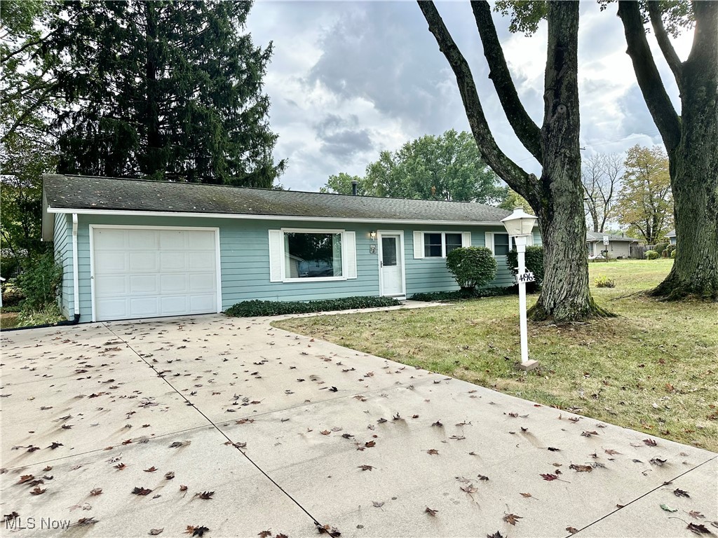 Welcome Home to 4196 Sabin Drive! This delightful ranch offers easy one-floor living on a lovely corner lot in the heart of Rootstown. Inside, you’ll find 3 comfortable bedrooms and a beautifully updated full bath, a spacious living room filled with natural light from the large picture window, and a cheerful eat-in kitchen with a stove and refrigerator included. Patio doors open to a sun room, the perfect spot to relax while enjoying views of the backyard. Convenient first-floor laundry with washer & dryer and an attached one-car garage add to the everyday ease. Just minutes to NEOMED, local school, shopping, and major highways, this move-in ready home is waiting for your personal touch. Come see the warmth and potential today!