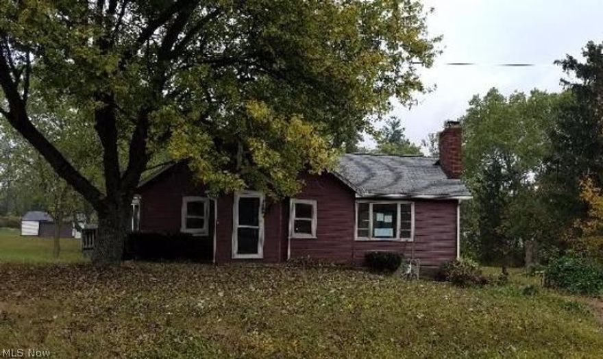 This bungalow style 2-bedroom and 1-full bathroom is perfect for you! Located in Stark County, this sweet looking home has approximately 1,344 square feet of a living space that sits on approximately 1.25 acres lot size. Built in 1940, this property offers kitchen with built-in cabinet, fireplace, full basement, backyard, and a garage. Don’t miss this one. Place you best offer.