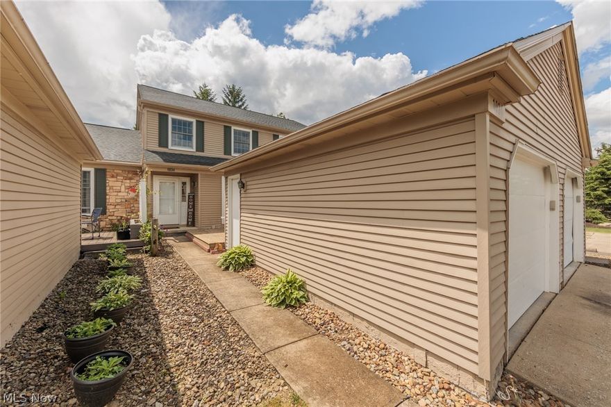 Wonderful 2 bedroom, 1.5 bath townhome situated in Medina's lovely Old Sturbridge Village community! As you enter, you are welcomed by the spacious kitchen complete with ample cabinetry, pantry, plenty of prep space and included appliances. The kitchen leads to the dining room that overlooks the light & bright living room w/ cozy fireplace. A 1/2 bath completes the main level. Upstairs you will find two nice sized bedrooms, showcasing the owners' suite with large walk-in closet. The full bath features an updated tiled tub surround. More living space is found in the finished basement w/ spacious recreation room, ample storage space and laundry area. You will love entertaining or simply relaxing on the private deck and patio, one is located off the kitchen and the other off the living room. Convenient detached garage. Located near parks, schools and Medina Square! Call today for a private showing!