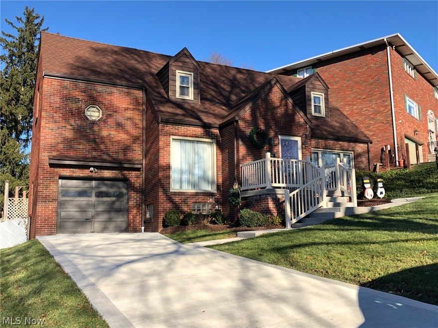 DON'T MISS OUT ON THIS 3 FLOORS OF LIVING SPACE BRICK HOME .. BEAUTIFULLY DONE AND PERFECT FOR ENTERTAINING WITH NEWER KITCHEN WITH AN ISLAND , ADDED ON FAMILY ROOM WITH CATHEDRAL WOOD CEILING. LARGE DINING ROOM FOR FAMILY GATHERINGS, 1/2 BATH AND LAUNDRY ROOM ON 1ST FLOOR, FRENCH DOORS TO TREK DECK WITH ABOVE GROUND HEATED POOL (12X24 OVAL), AND ADDITIONAL DECK.  3 LARGE BEDROOMS ON SECOND FLOOR, BASEMENT HAS RECROOM WITH ADDITIONAL ROOM FOR PLAY AREA AND BATH WITH A SHOWER .  ALL NEW CONCRETE SURROUNDS HOME AND NEW DRIVEWAY, PORCH AND STEPS,. ALSO NEWER ARE THE FURNACE, HOT WATER RANK, ROOF ,200 AMP SERVICE. THERE ARE 2 CENTRAL AIR CONDITIONERS AND ONE FURNACE. WON'T LAST LONG, CALL TO VIEW.