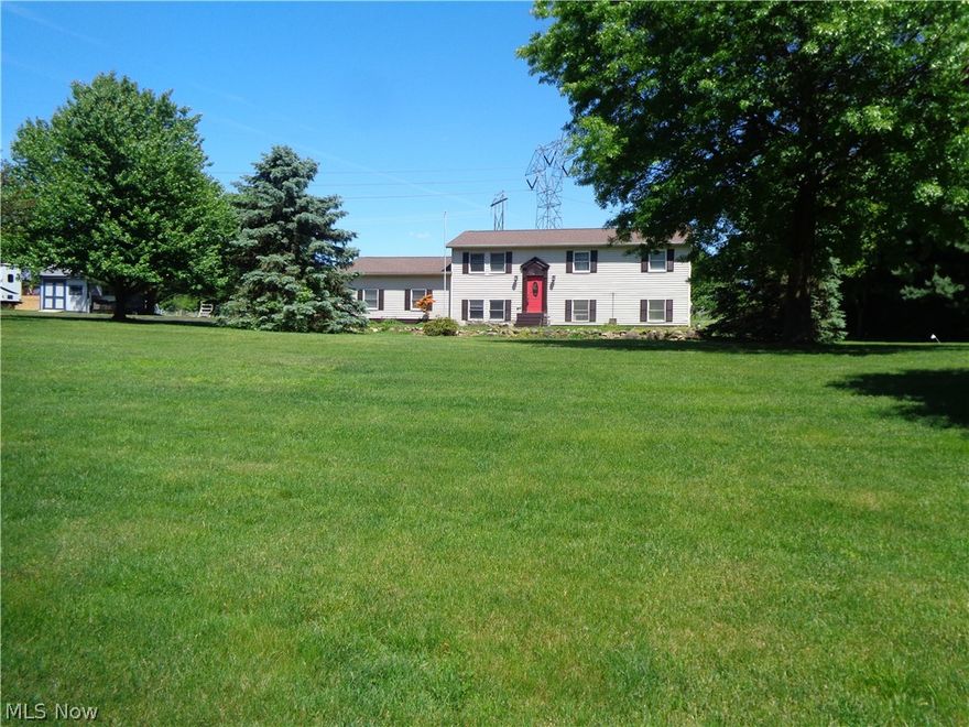 Country Living! Enjoy the clean air and peaceful lifestyle being offered by this 4 BR / 3 Bath home situated on 1.75 acres in Shalersville Township. Open floor plan. Tastefully remodeled throughout. Granite countertops and newer SS appliances in kitchen.  The multi-tier deck along the rear of the home is a perfect place to take in the scenic surroundings. Possible in-law or teen suite in lower level. There is also a 20 X 40 outbuilding that offers many possibilities.