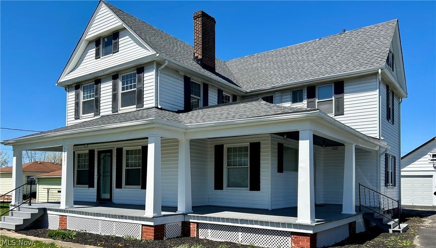 Discover the perfect blend of history and modern luxury in this stunning century colonial home! Fully renovated with contemporary design, it boasts luxury vinyl floors, recessed lighting, and a captivating fireplace with marble-tiled surround in the living room. Ornate columns lead to the dining room, connecting to an enclosed porch. Elevate your culinary experience in this exquisite home! The kitchen is a masterpiece, featuring granite countertops with a stylish peninsula, a striking cherry-red Elkay Maraschino sink, a chic white subway tile backsplash, and abundant grey cabinets. Cooking has never been more luxurious! Experience opulence on the main floor with a bedroom retreat! The en-suite bathroom is a marvel, showcasing floor-to-ceiling marble tile, a generous vanity, and a sleek frameless LED mirror. Upstairs, three spacious bedrooms await with fresh paint and new carpet, accompanied by an updated full bathroom to enhance your living experience! Unwind in the generous lower level, boasting a recreational haven for entertaining. Ample space for storage and a convenient laundry area make this the ultimate multifunctional retreat. Experience elegance and comfort in every detail! Minutes to downtown Cleveland, freeways, Cleveland Clinic South Pointe Hospital, and  Parks!