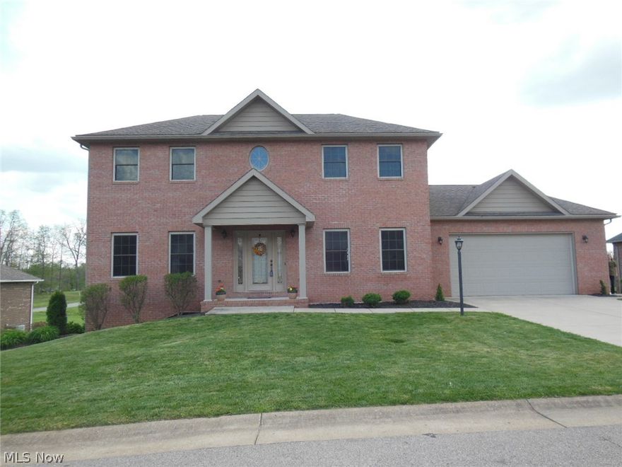 Stan Bucklew home. All main level flooring and trim is light oak hardwood. Spacious kitchen area of the great room has beautiful light oak Kraftmaid cabinets with seamless countertops, solid 6-panel doors throughout, large master featuring a whirlpool tub plus shower, 1st floor half bath, 2nd floor laundry. Full walkout basement is mostly finished with a rec room, kids' media room, a kitchenette, and an office. Steel girder construction. There is a deck off the great room and a patio off the rec room. Home owners fees $400 annually with $100 initiation fee. Westwood Subdivision offers a walking trail.  Elem: Blennerhassett Elementary School, Elem/Bus: Y.  JrHigh: Blennerhasset Jr. High School, JrHigh/Bus: Y.  High: Parkersburg South High High, Bus: Y.  Fire: VOL. Police: SHF.
Square Feet: Above Grade Fin. 2320; Basement Fin. 1052; Basement Unfin. 108.