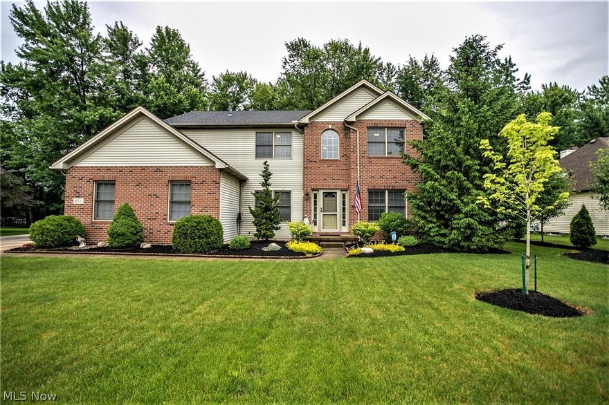 This beautiful home was crafted by a Terry Bennett Builders and offers impressive architectural details, a timeless floor plan, energy efficient construction standards, and enduring quality. Recent updates include a new roof with 30-year shingles, quartz countertops in the kitchen, new stainless steel appliances, new front & patio doors, new hot water tank, updated flooring & paint, and new light fixtures. From the moment you enter the impressive entryway you will realize this is not a cookie cutter home...with a 2 story foyer, formal living & dining rooms, and gleaming hardwood flooring no expense was spared in the recent improvements made to this home. The chef in your home will love the recently updated kitchen featuring quartz countertops & stainless steel appliances. With four large bedrooms, a huge 1st floor laundry room & side entry garage - you'll have the space you need to accommodate your growing family. The backyard is your private oasis...the perfect place to entertain frie