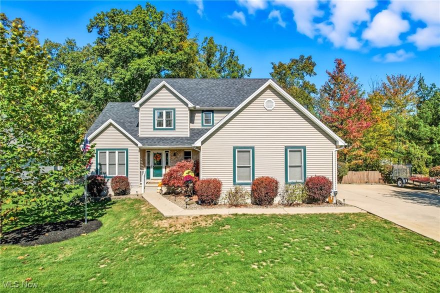 Welcome to 6947 Winter Park Avenue in Austintown, Ohio! This beautifully maintained 4–5 bedroom, 3.5-bath home offers 2,142 sq. ft. of thoughtfully designed living space on one-third of an acre in a highly desirable neighborhood.

Step inside to a stunning great room featuring an impressive 18-foot ceiling and a cozy wood-burning fireplace with a gas starter. The gourmet kitchen showcases granite countertops, a large island, full pantry, and flows seamlessly into the dining area and mudroom with custom cubbies. A convenient first-floor laundry makes daily living effortless.

The first-floor master suite is a true retreat with a tray ceiling, spa-style walk-in shower featuring dual shower heads, towel warmer, Bluetooth speaker system, and a custom closet system. Additional bedrooms upstairs also feature custom closets and ceiling fans for year-round comfort.

The finished basement adds exceptional living space, complete with a full bath, custom bar, and an additional area perfect for a recreation room, office, or guest suite.

Enjoy outdoor living on the two-tier deck with a relaxing hot tub that stays with the home! The property also offers a 200 sq. ft. storage shed, built-in storage in the garage and basement, and a nicely landscaped yard.

Major updates include a new roof (October 2025), air ducts cleaned (April 2025), and carpets cleaned (October 2025). A Guard Home Warranty and pre-inspection are included for added peace of mind.

This home truly has it all—style, function, and quality in a fantastic location. Don’t miss your chance to make 6947 Winter Park Avenue your next home—it won’t last long!